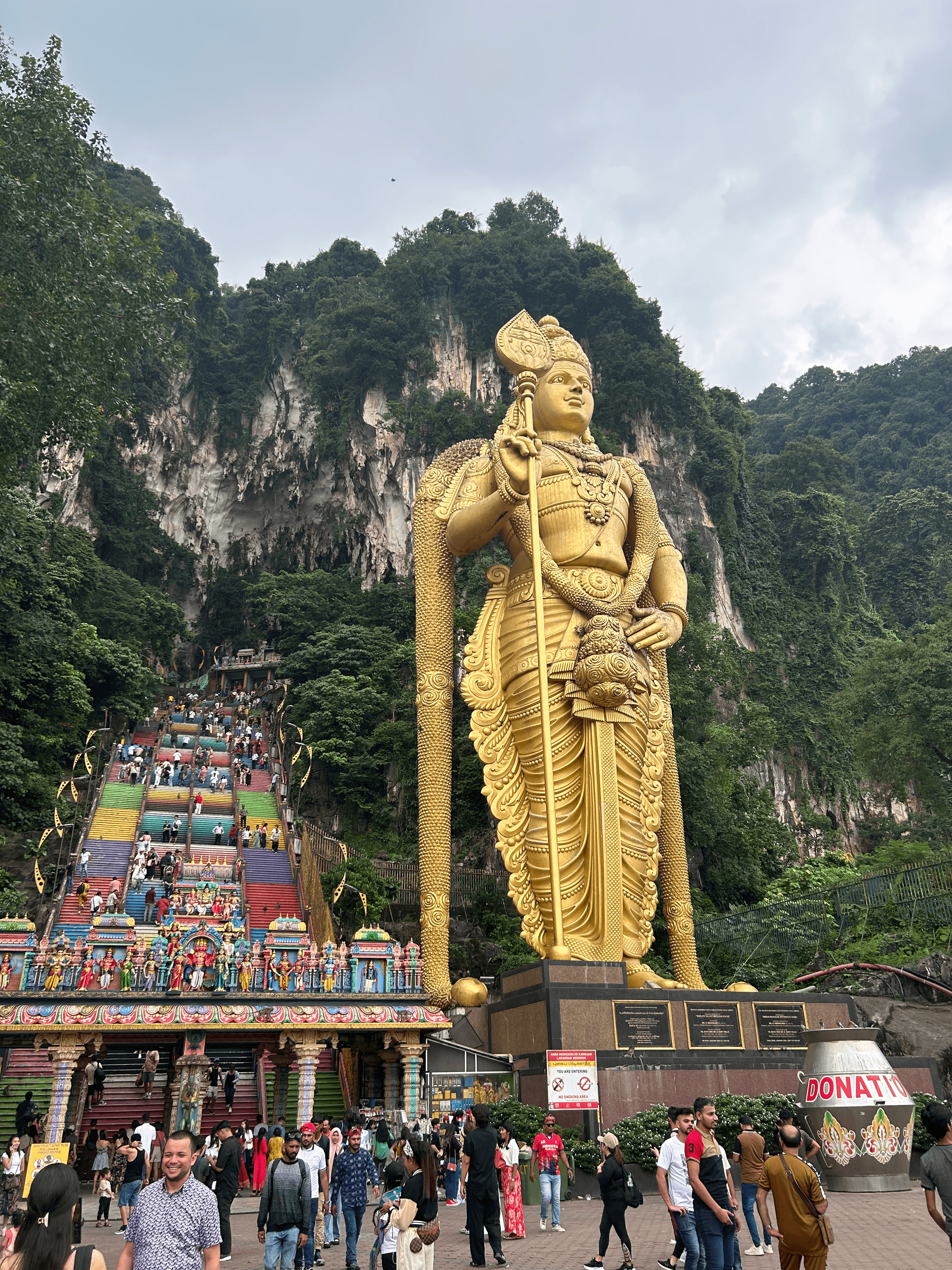 Golden Buda statue in from of stairs